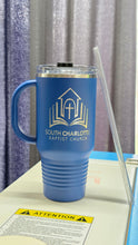Load image into Gallery viewer, Blue tumbler with handle laser engraved with logo of church used for branded drinkware