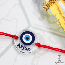 Load image into Gallery viewer, Evil Eye rakhi with personalized name for Raksha Bandhan protection