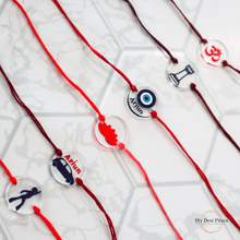 Load image into Gallery viewer, Evil eye rakhi tied on wrist for Rakshabandhan