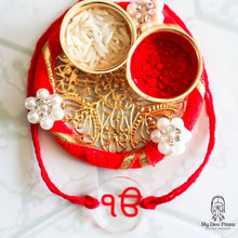 Load image into Gallery viewer, Engraved Ik Onkar rakhi pendant on thread bracelet
